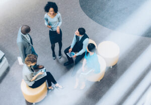 Overhead view of employees meeting outside 1536 x 1067